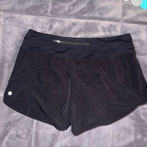 black lululemon speed up 4" size 10